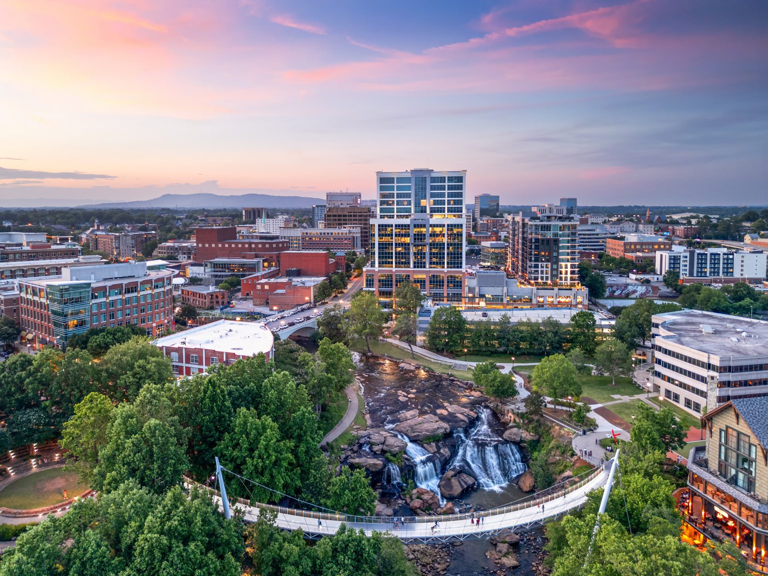 Greenville, South Carolina at Falls Park on Reedy Creek at dusk.